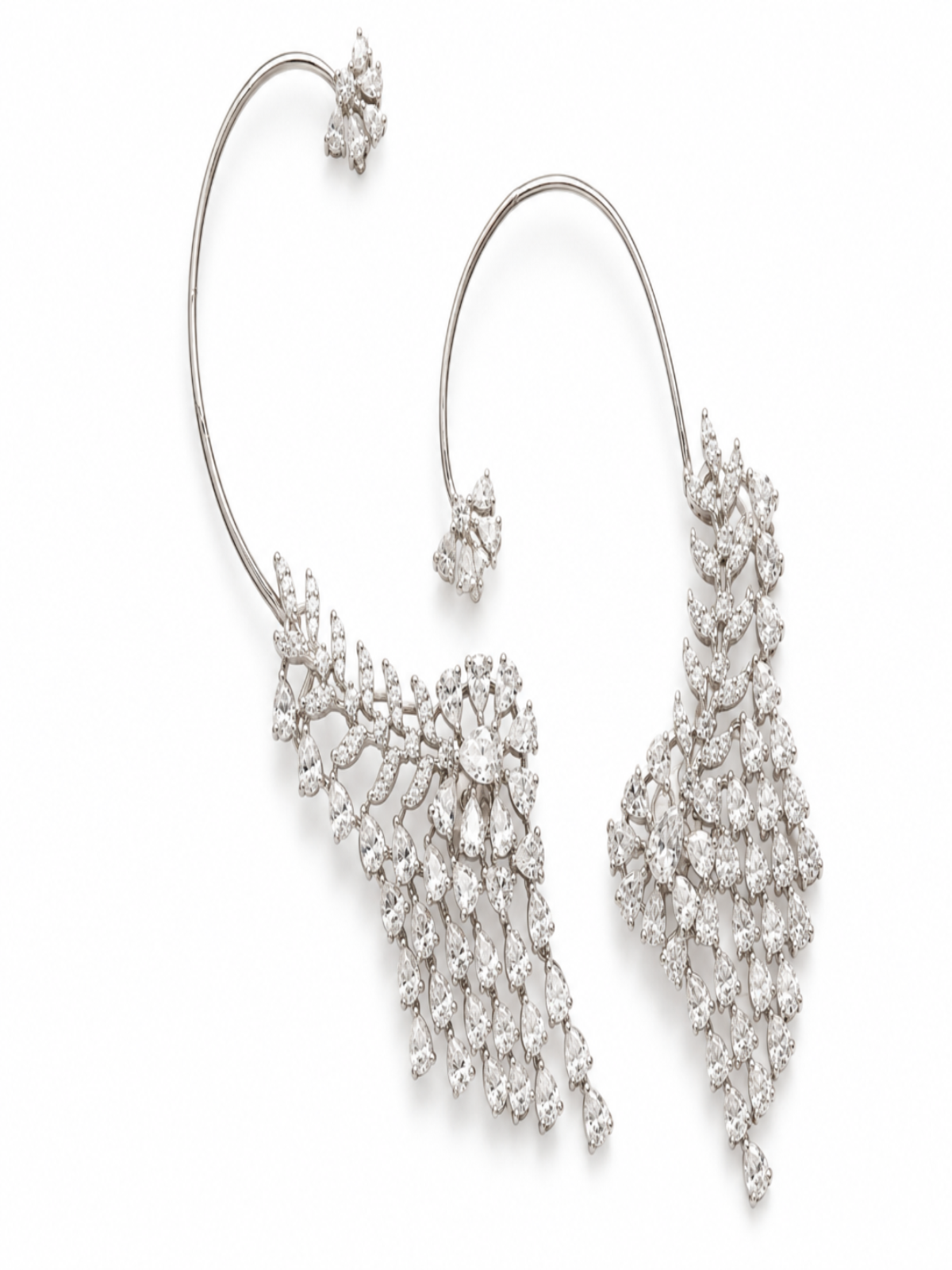 A pair of silver hoop earrings adorned with intricate clusters of clear gemstones, displayed on a clean white background.