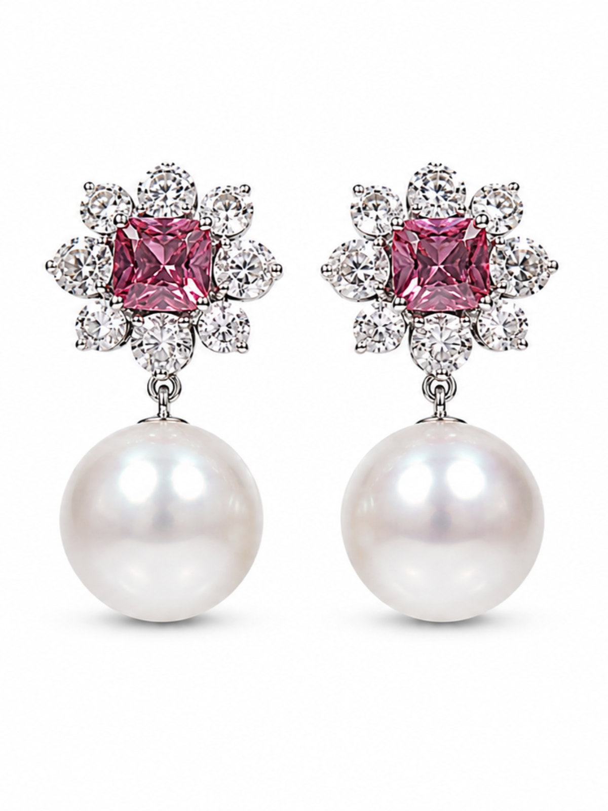 A pair of drop earrings featuring a central square pink gemstone surrounded by small clear stones, with a large white pearl hanging below, shown on a plain white background.